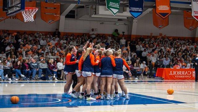 Carroll Women's Basketball huddles up before NCAA game